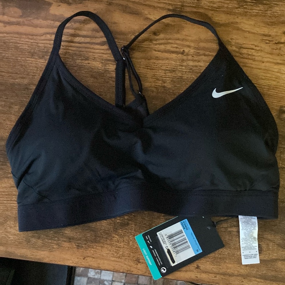 Women’s BNWT black light support sports bra medium. Mesh panel on back $35. OBO